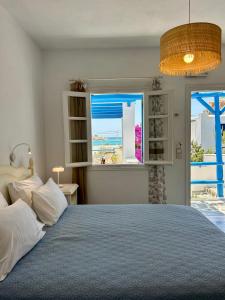 Posteľ alebo postele v izbe v ubytovaní Sea View Apartments & Studios