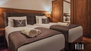 Postel nebo postele na pokoji v ubytování V Orman Resort