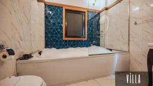 Koupelna v ubytování V Orman Resort + 51 fotografií