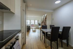 Η κουζίνα ή μικρή κουζίνα στο Luxury Apartments by Livingdowntown