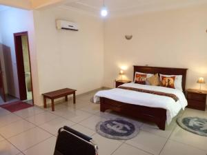 Una cama o camas en una habitación de Résidence hôtelière La Roseline, Omnisport