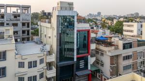 an aerial view of a building in a city at 4 BHK Luxury Penthouse- Sliceinn Velvet, Wilson Garden, Bangalore in Bangalore