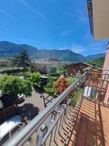a balcony with a view of the mountains at Casa Alby in Levico Terme