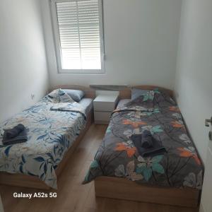 Postel nebo postele na pokoji v ubytování Apartment Antonia - Gevgelija