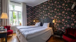 Postel nebo postele na pokoji v ubytování Villa Gransholm