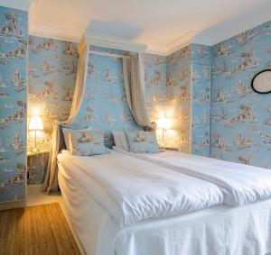 Postel nebo postele na pokoji v ubytování Villa Gransholm