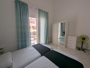 Ένα ή περισσότερα κρεβάτια σε δωμάτιο στο Large Townhouse close to Beach +44 φωτογραφίες