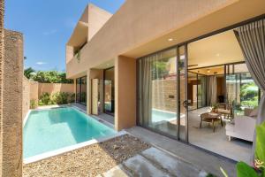 an image of a house with a swimming pool at Qvilla Sand, An Bang beach, Hoi An in An Bàn (2)