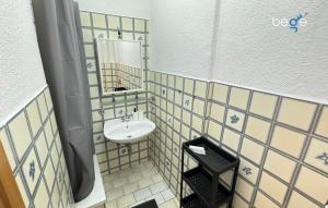 Ένα μπάνιο στο BEGE APARTMENTS Business Studio