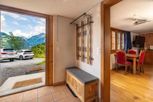 a room with a sliding glass door with a view of a car park at Cozy Studio With Terrace Bbq Mountain View in Ober Stafel