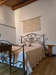 A bed or beds in a room at B&B I Martelli