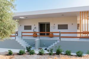 a view of the front of a building at Sunset Dreams Vaggelis in Skaliá
