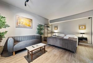 Katil atau katil-katil dalam bilik di Astro Apartments