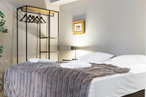 Katil atau katil-katil dalam bilik di Astro Apartments