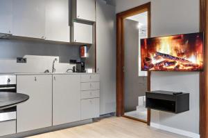 Dapur atau dapur kecil di Astro Apartments