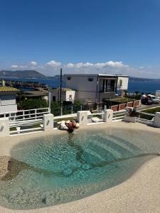Bazén v ubytování Pharus Miseni Suites and rooms nebo v jeho okolí