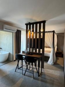 Ένα ή περισσότερα κρεβάτια σε δωμάτιο στο Five Apartments