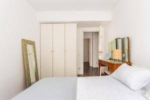 Ένα ή περισσότερα κρεβάτια σε δωμάτιο στο Charming apart by the beach