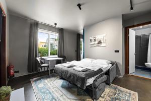 Katil atau katil-katil dalam bilik di Astro Apartments