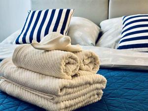 En eller flere senge i et værelse på Na Fali 4 Aquapark Reda