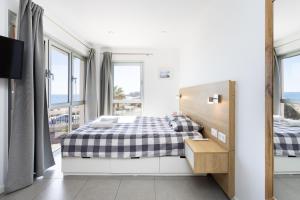Postel nebo postele na pokoji v ubytování Panoramic sea view apartment