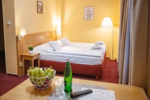 Postel nebo postele na pokoji v ubytování Hotel U Salzmannů + 37 fotografií