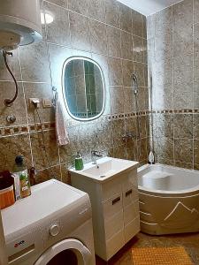Kupatilo u objektu Apartman NS Dan CENTAR