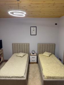 Postel nebo postele na pokoji v ubytování Kadena Guesthouse