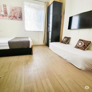 Postel nebo postele na pokoji v ubytování bugrashov 13 room