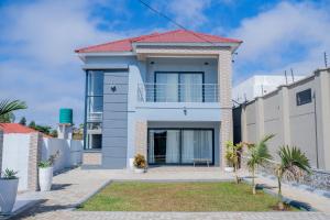 a house with a red roof at Forest View Apartment in Blantyre