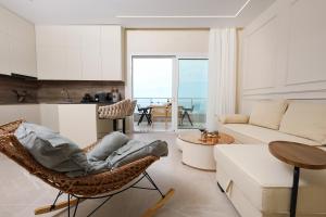 a living room with a couch and a table at Villa Christianna Free Parking in Vlorë