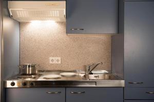 A kitchen or kitchenette at Arion Cityhotel Vienna