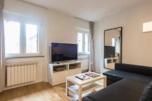 A television and/or entertainment centre at CDT Duomo