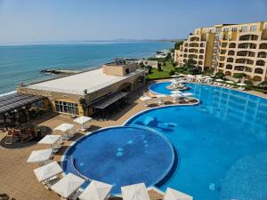 an aerial view of a resort with a large swimming pool at Boho Breeze Aheloy in Aheloy