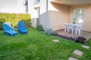 Κήπος έξω από το Appartement avec jardin et plage