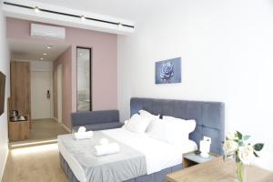 Postel nebo postele na pokoji v ubytování Hotel La Rosa