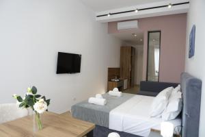 Postel nebo postele na pokoji v ubytování Hotel La Rosa