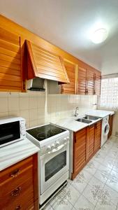 Kuchyň nebo kuchyňský kout v ubytování LOS IRIS PLAYA DE GANDIA- Apartamento Familiar