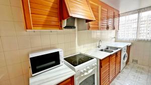 Kuchyň nebo kuchyňský kout v ubytování LOS IRIS PLAYA DE GANDIA- Apartamento Familiar + 37 fotografií