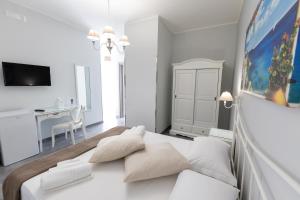 TV o dispositivi per l'intrattenimento presso Bed and Breakfast Arcobaleno