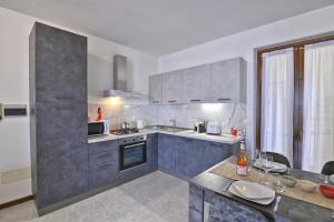 Afbeelding uit fotogalerij van Appartamento Casa Ledio - Theater Home in Tignale