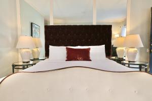 Ένα ή περισσότερα κρεβάτια σε δωμάτιο στο Foley House Inn