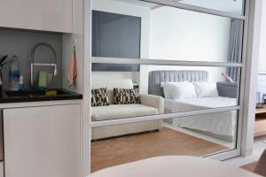 Postel nebo postele na pokoji v ubytování Pure Sunset Beach Resort + 27 fotografií