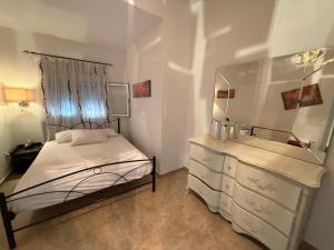 Ένα ή περισσότερα κρεβάτια σε δωμάτιο στο Silot apartment 5 +4 φωτογραφίες