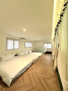 Postel nebo postele na pokoji v ubytování Peranakan House Convenient Stay near Jonker 6-12 pax