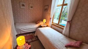 Katil atau katil-katil dalam bilik di Space to enjoy - 2BR Apt Smögen