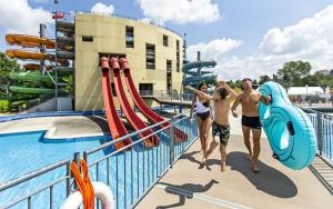 a group of people at a swimming pool at Soba tete Tile - Hiša ob gozdu in Ptuj