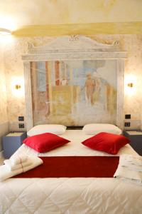 En eller flere senge i et værelse på Odeon Neapolis