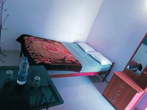 Postel nebo postele na pokoji v ubytování Thekkekara Budget Rooms
