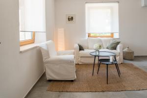 Posezení v ubytování L'Abbraccio della Quercia - Apartments